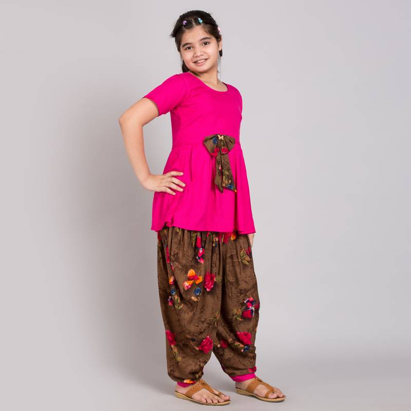 Pink rayon printed girls stitched    Kurta  &    Salwar