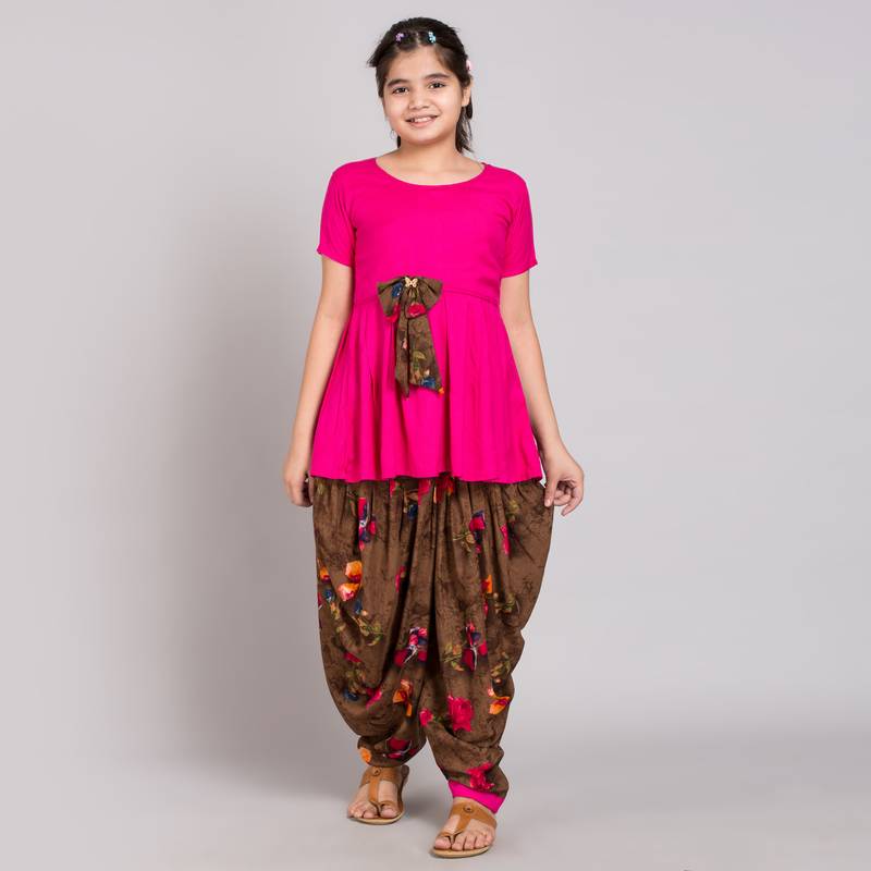 Pink rayon printed girls stitched    Kurta  &    Salwar