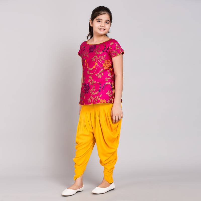 Pink rayon printed girls stitched    kurta &   patiala