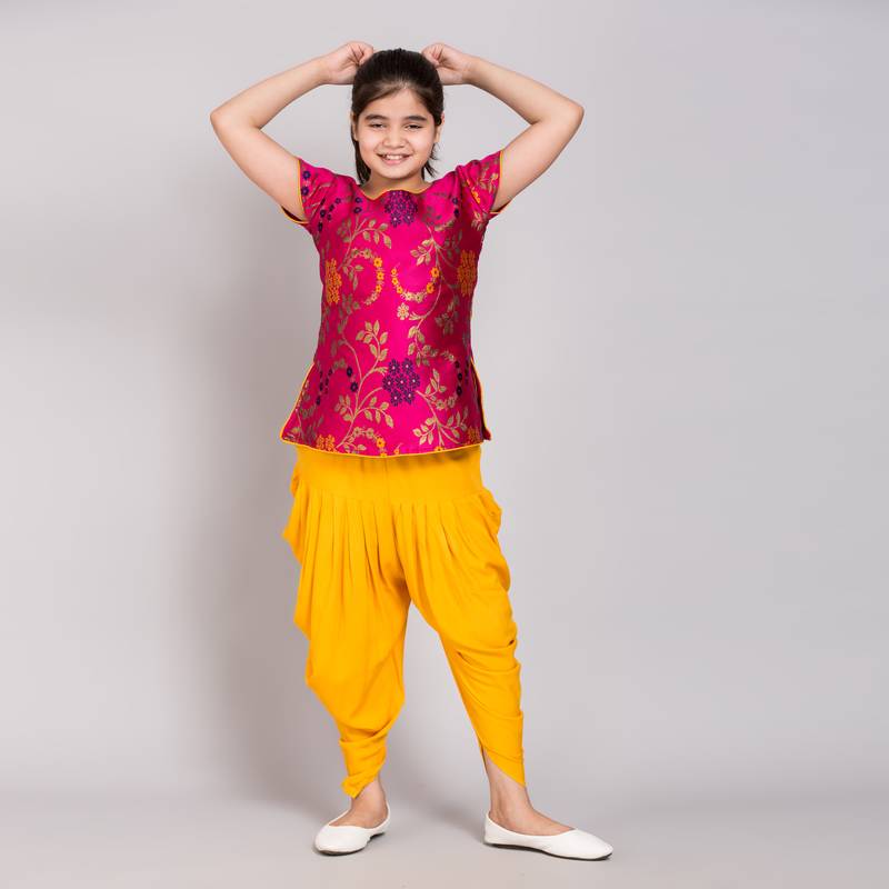 Pink rayon printed girls stitched    kurta &   patiala