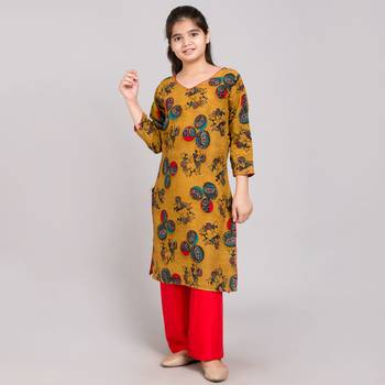 Yellow rayon printed girls stitched    Kurta  &    Pallazo 1