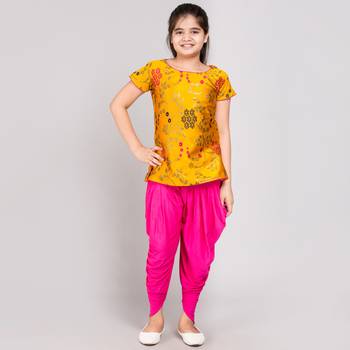 Yellow rayon printed girls stitched    kurta &   patiala 1