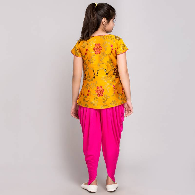 Yellow rayon printed girls stitched    kurta &   patiala