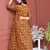 MUSTARD PRINTED KURTA AND BOTTOM