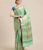 Green silk woven saree with blouse