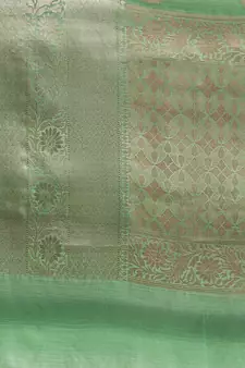 Green silk woven saree with blouse