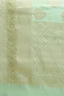 green silk woven saree with blouse