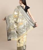 Beige silk woven saree with blouse
