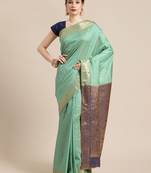 Green silk woven saree with blouse