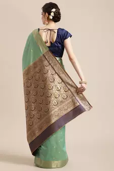 Green silk woven saree with blouse