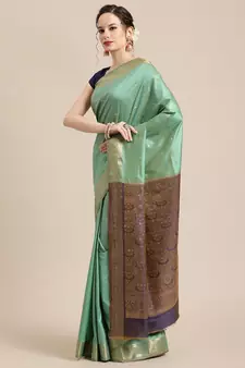 Green silk woven saree with blouse