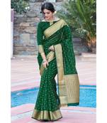 green organza woven saree with blouse