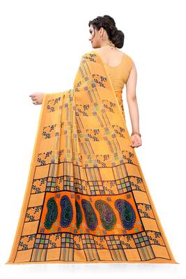Light orange printed georgette saree with blouse 3