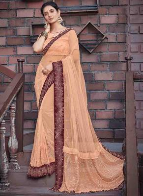 Peach embroidered net saree with blouse 1