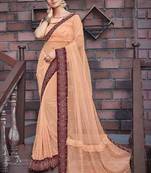 Peach embroidered net saree with blouse