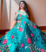 Teal  Embroidered Net Semi-Stitched Lehenga & Unstitched Blouse With Dupatta