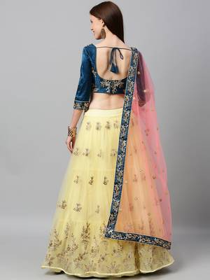yellow embroidered net semi stitched lehenga 3