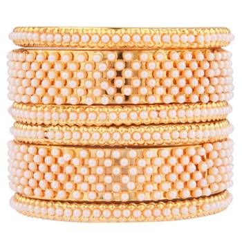 Gold pearl bangles-and-bracelets 1