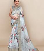 Off white printed organza saree with blouse