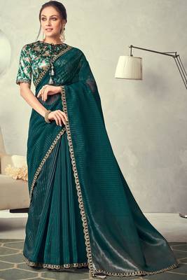 Teal embroidered tissue saree with blouse 1