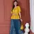 YELLOW PRINTED PEPLUM TOP WITH SKIRT AND POTLI
