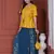 YELLOW PRINTED PEPLUM TOP WITH SKIRT AND POTLI