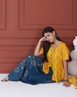 Yellow Printed Peplum Top With Skirt And Potli 4