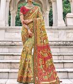 Yellow embroidered silk saree with blouse