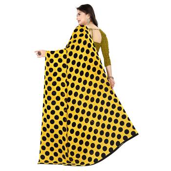 Yellow printed faux georgette saree with blouse 3