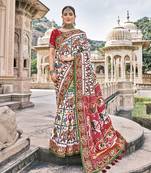 White embroidered patola saree with blouse