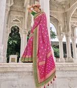 Pink embroidered patola saree with blouse
