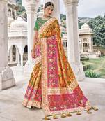 Orange embroidered patola saree with blouse