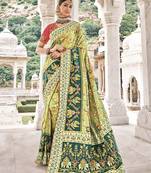 Parrot green embroidered patola saree with blouse