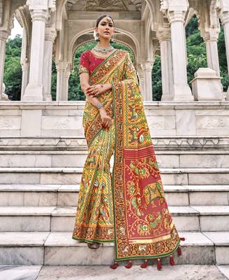 Yellow embroidered patola saree with blouse 1