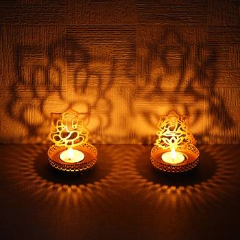 Set of  Ganesha and Laxmi Shadow Tea Light Holder 1