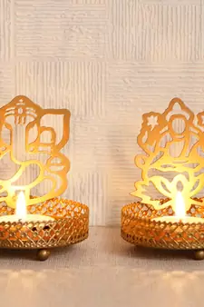 Set of  Ganesha and Laxmi Shadow Tea Light Holder