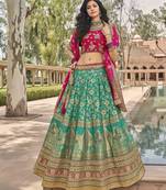 Green embroidered silk semi stitched lehenga