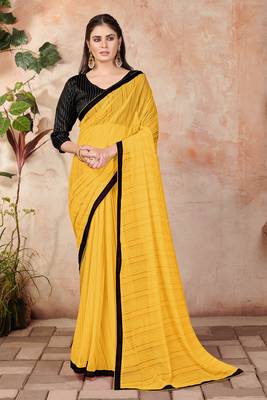 Yellow plain lycra saree with blouse 1