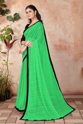 Green plain lycra saree with blouse 2