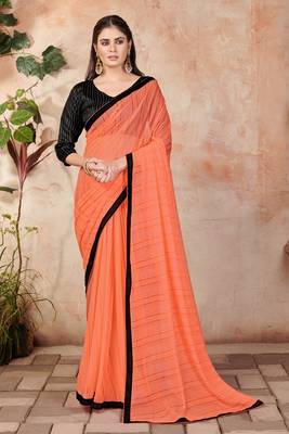 Orange plain lycra saree with blouse 1