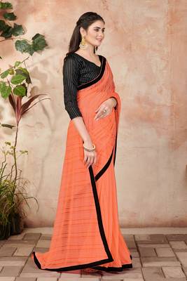 Orange plain lycra saree with blouse 3
