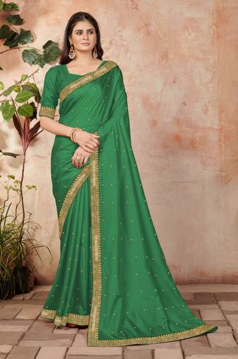 Green embroidered silk blend saree with blouse