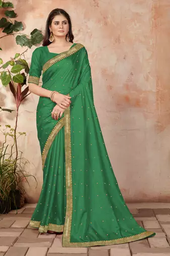 Green embroidered silk blend saree with blouse