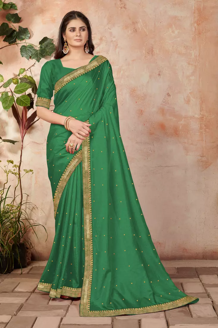 Green embroidered silk blend saree with blouse
