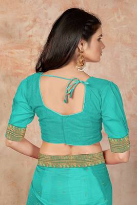 Turquoise embroidered silk blend saree with blouse 5