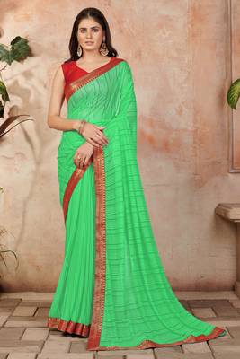 Green plain lycra saree with blouse 1