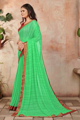 Green plain lycra saree with blouse 2