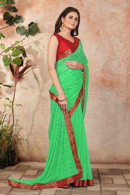 Green plain lycra saree with blouse 3