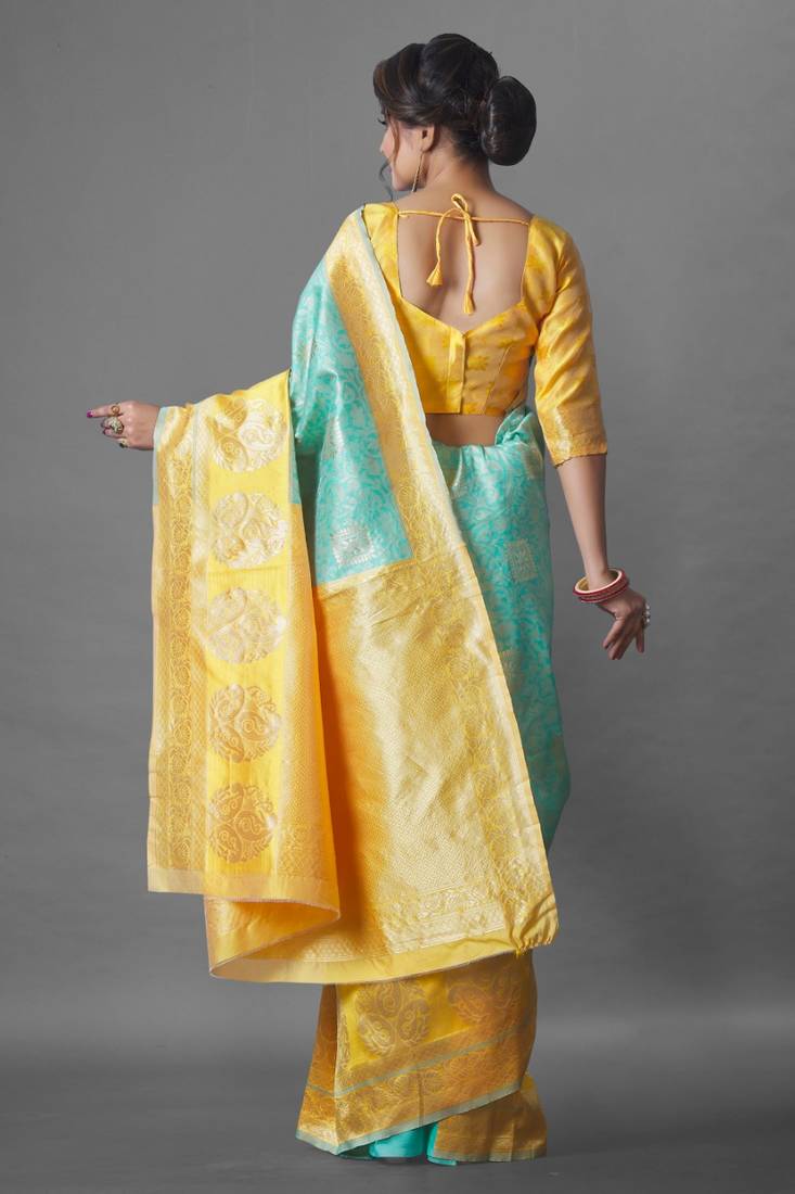 Teal silk embroidered saree with blouse