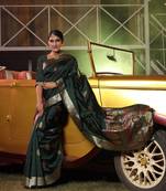 Dark green hand woven banarasi saree with blouse